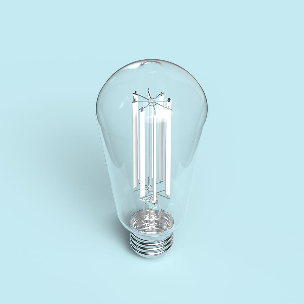 Clear light bulb on a light blue background